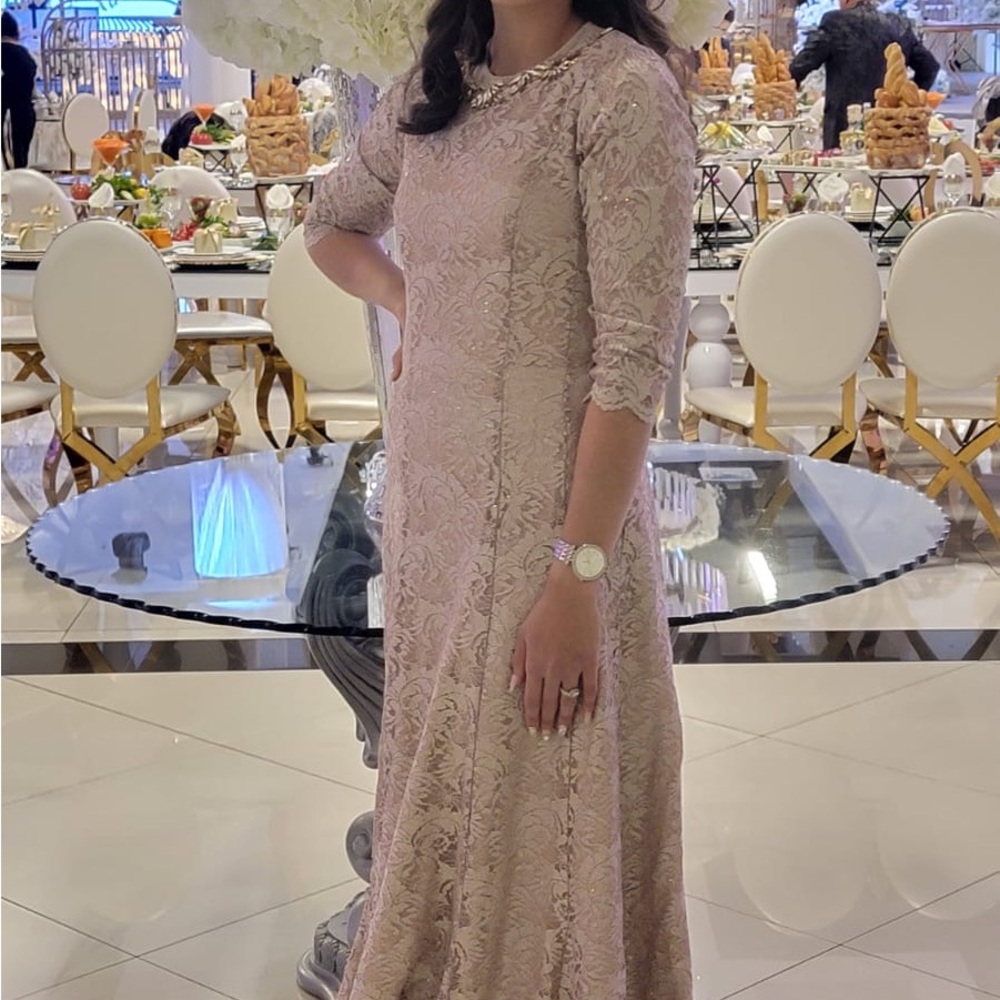 Tarani champagne gold gown